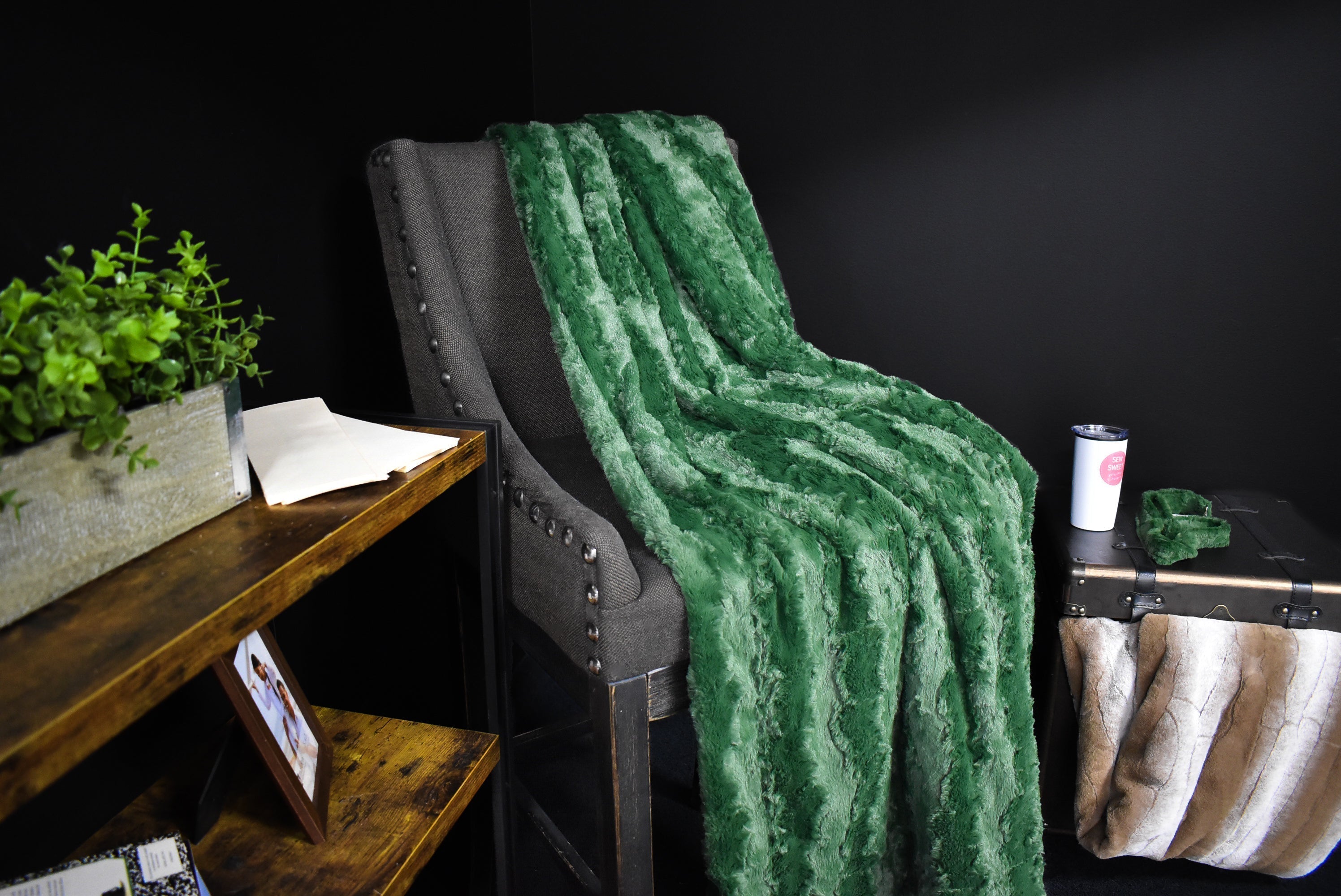 Luxurious green minky blanket on a chair
