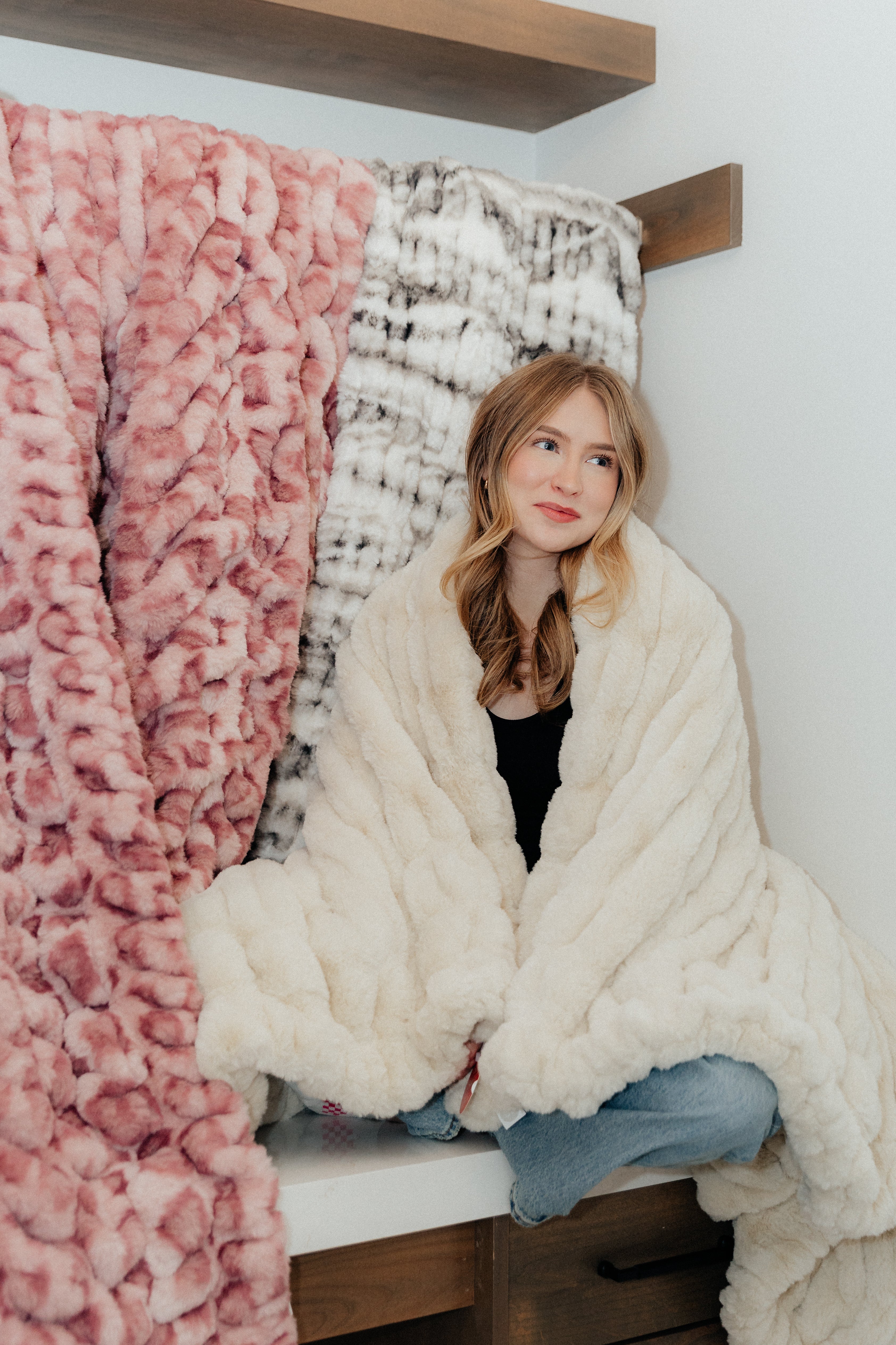 Girl with plush blankets