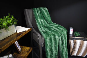 Luxurious green minky blanket on a chair