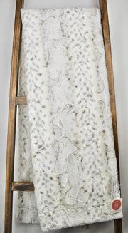 cream frosted tipped blanket with a Lynx animal print theme